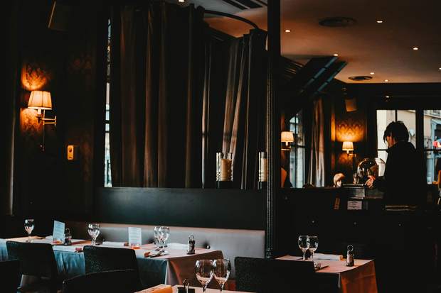 Evening service in a bistro dining room, Interior photography