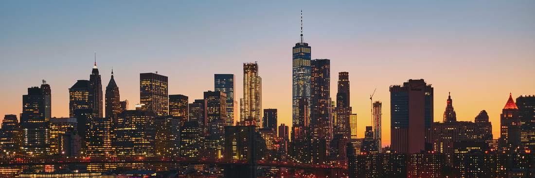 Lower Manhattan and the Brooklyn Bridge, New York at dusk